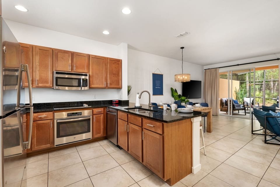 Open-concept dining and kitchen area, great for preparing meals while staying connected to the family.