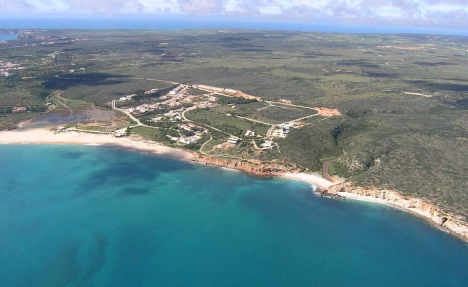 Aerial view of coastal property with sandy beaches — Villa Alcione, luxury holiday villa in Vila do Bispo