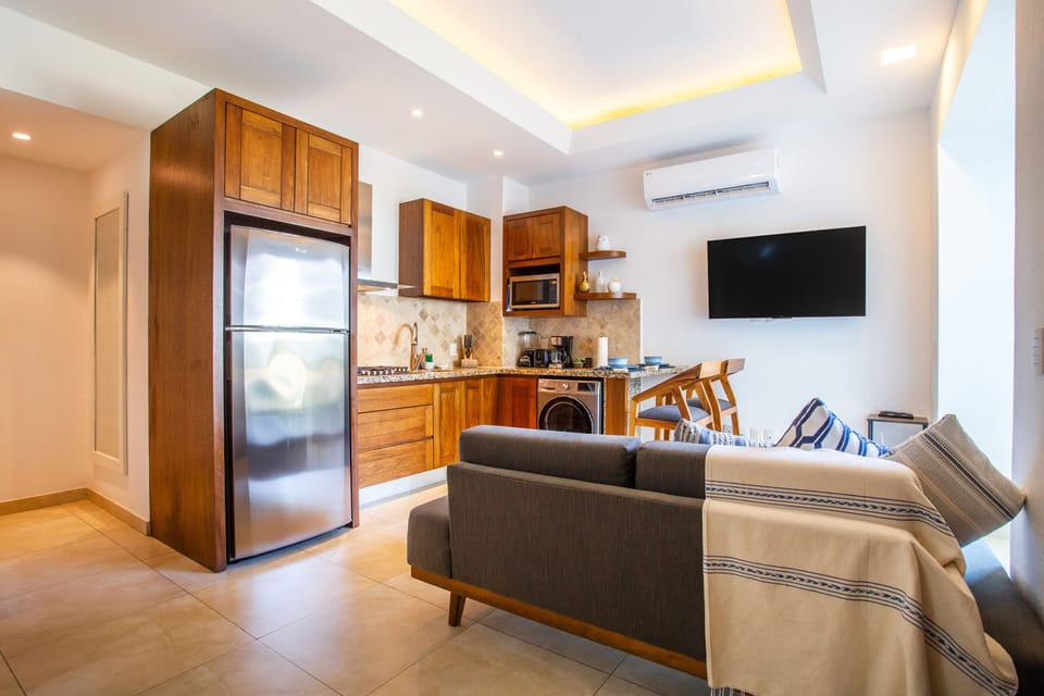 The smart TV can be watched from the comfort of the sofa or the bed