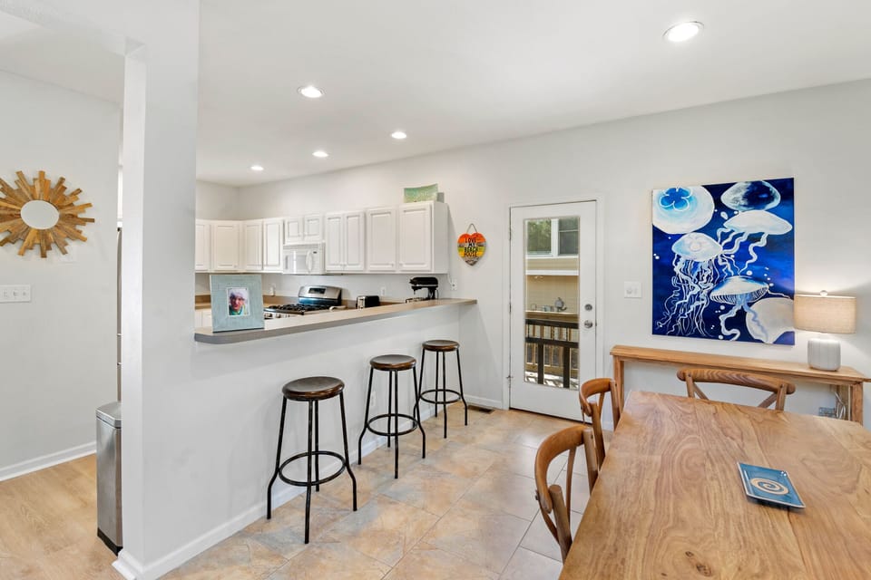 MB60: Dream Inn | Bottom Level Dining Area and Kitchen