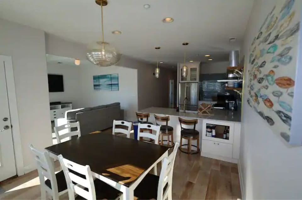 open concept living room kitchen and dining area 