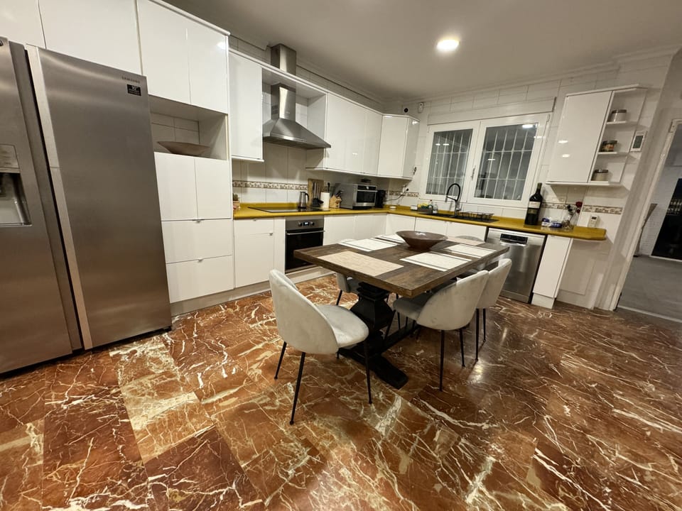 The retro 1960’s style updated kitchen with all stainless steel appliances.