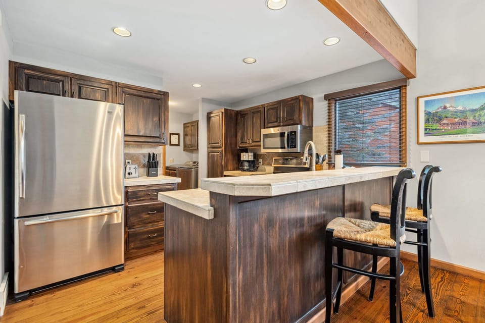 Sparkling clean fully equipped kitchen.