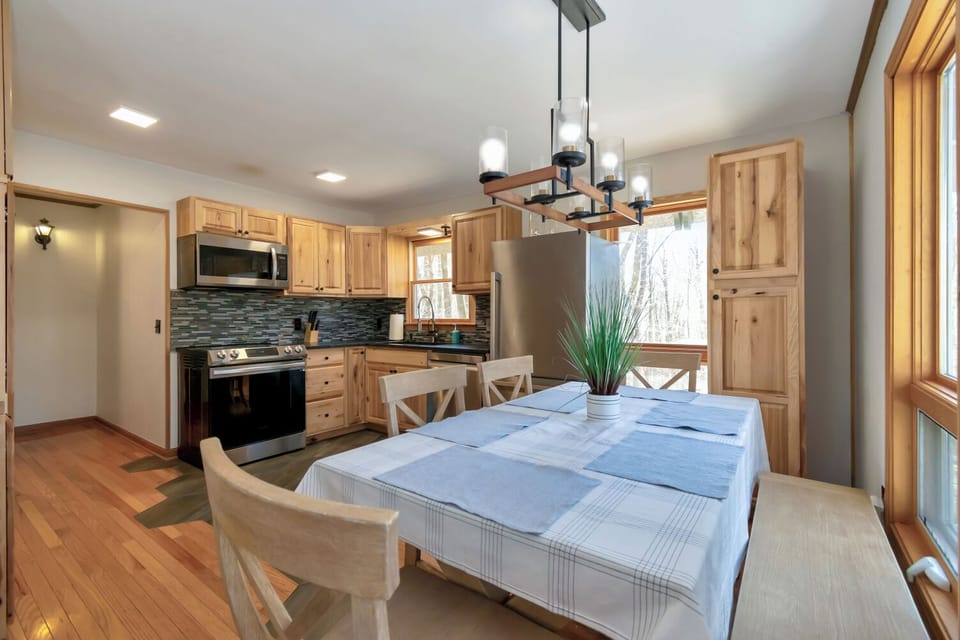 Cook and dine in comfort with a full kitchen and cozy dining space.