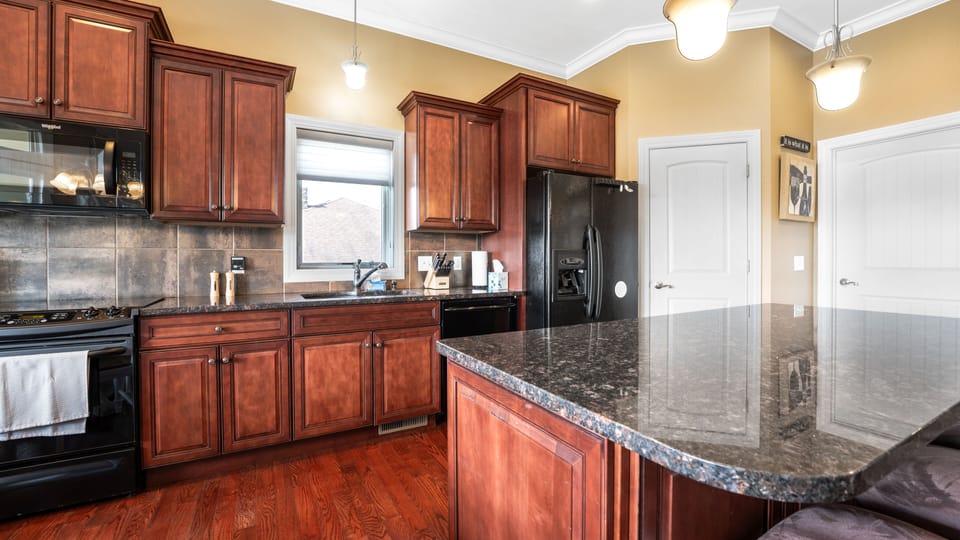 There is a FULLY STOCKED kitchen with a huge pantry for all the food to be kept
