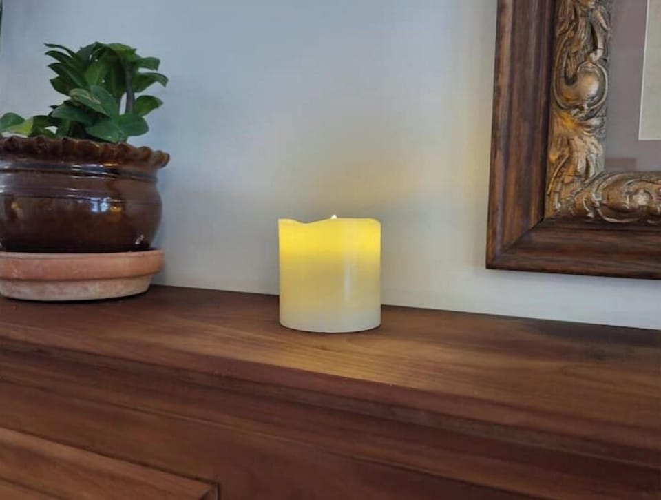 One of several battery powered, remote controlled candles for a cozy vibe.