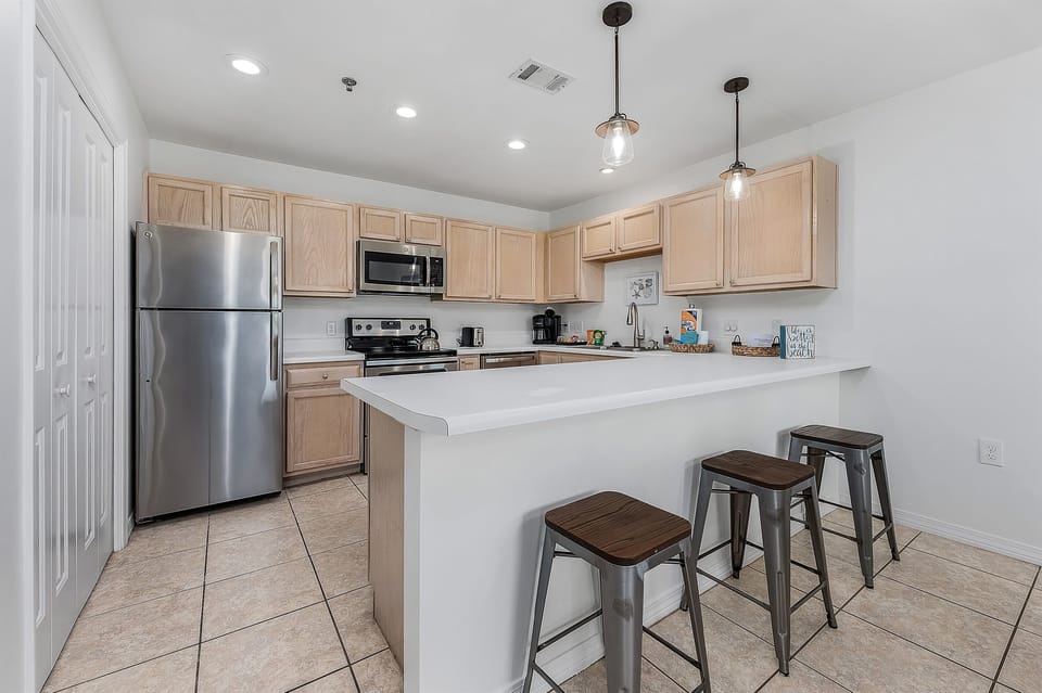 Kitchen counter top with 3 stools