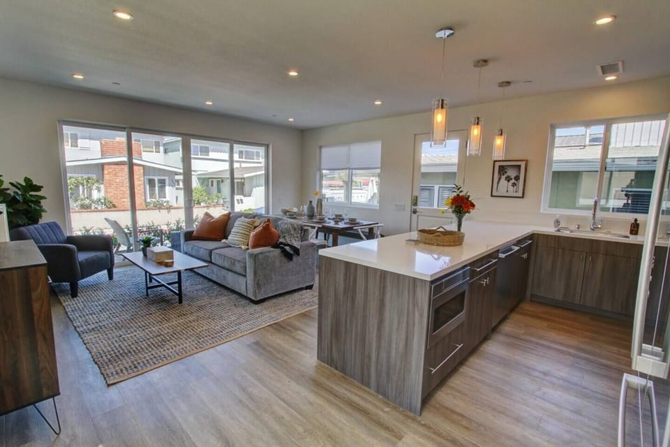 Front house Living and KitchenSofa folds out to sleep two guests.