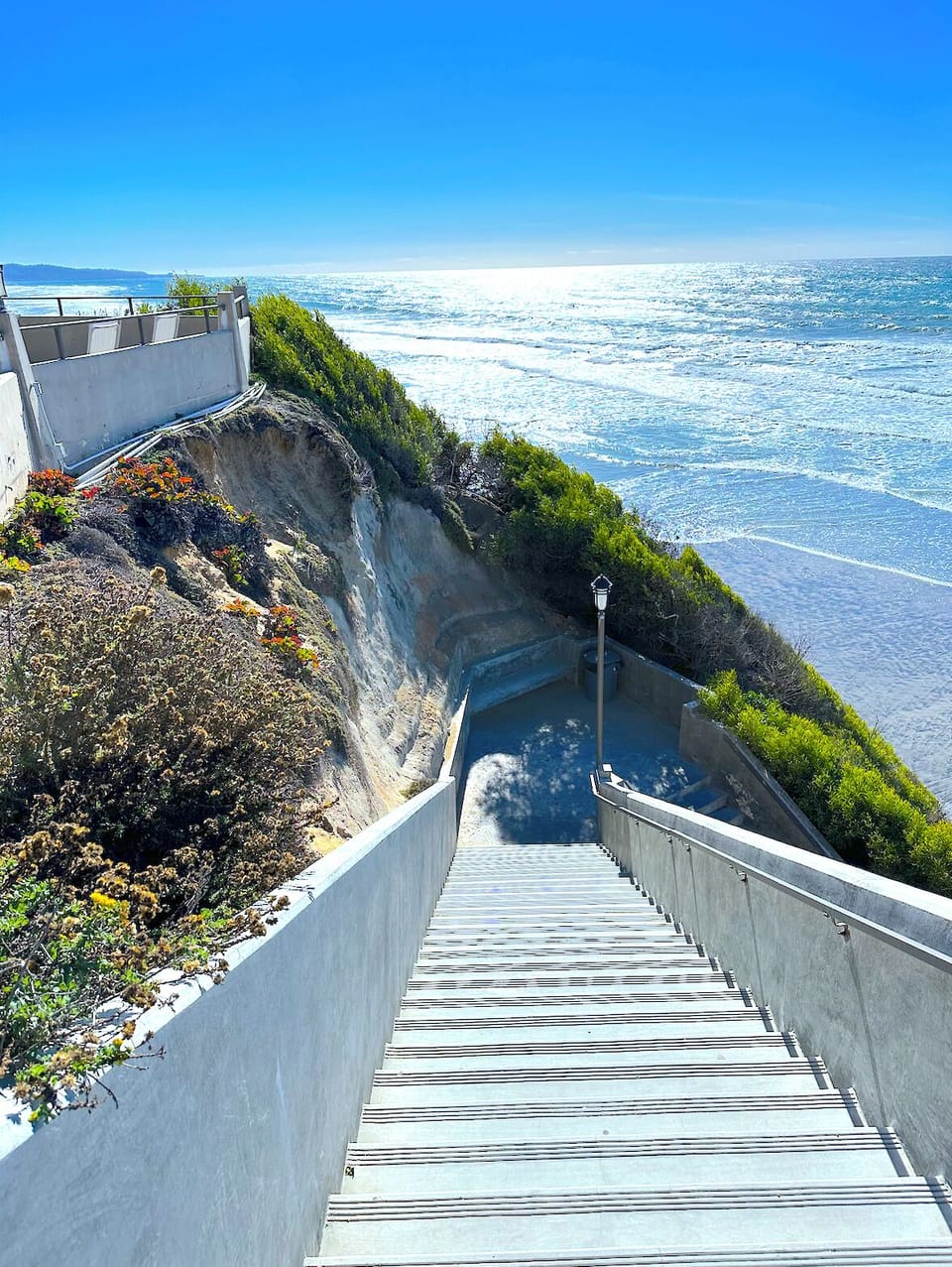 Staircase leads you right down to the sand and surf