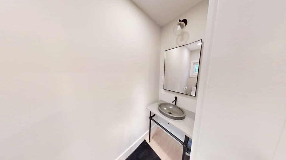 Alternate view of first floor half bath with bidet.