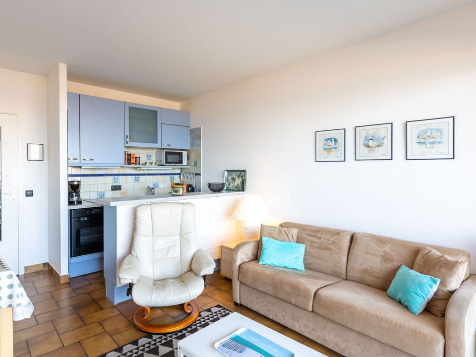 Couch, Picture Frame, Cabinetry, Azure, Table, Interior Design, Living Room, Studio Couch, Floor, Flooring