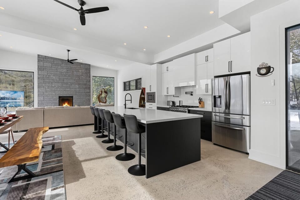Kitchen w/ Breakfast Bar, & Living Room