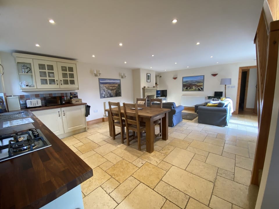 Open plan kitchen into dining area. 