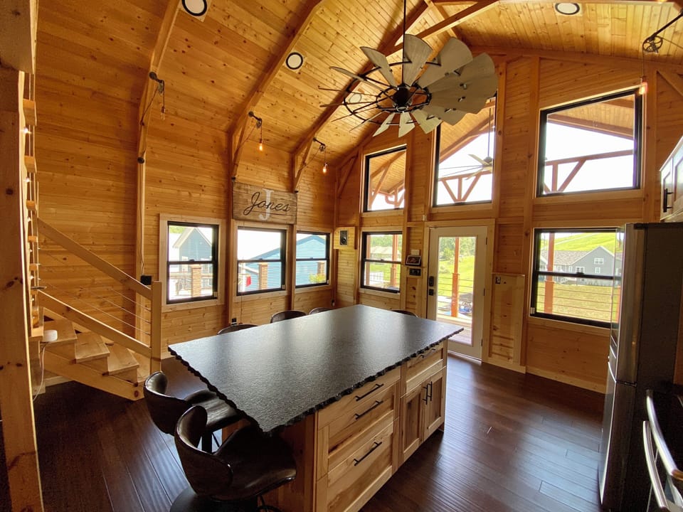 High ceilings, large windmill ceiling fan, covered front porch