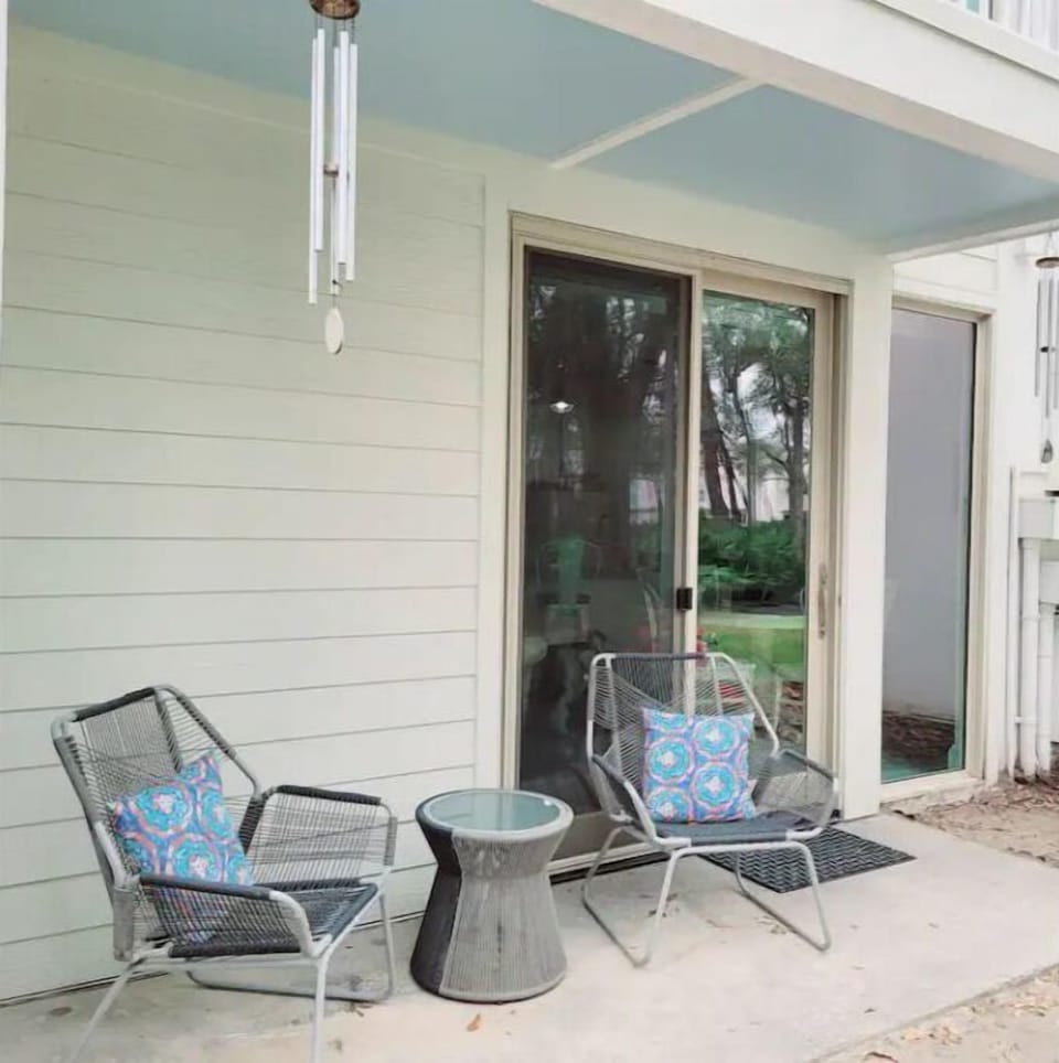 our wind chime patio looking out at oak and palm scrubs