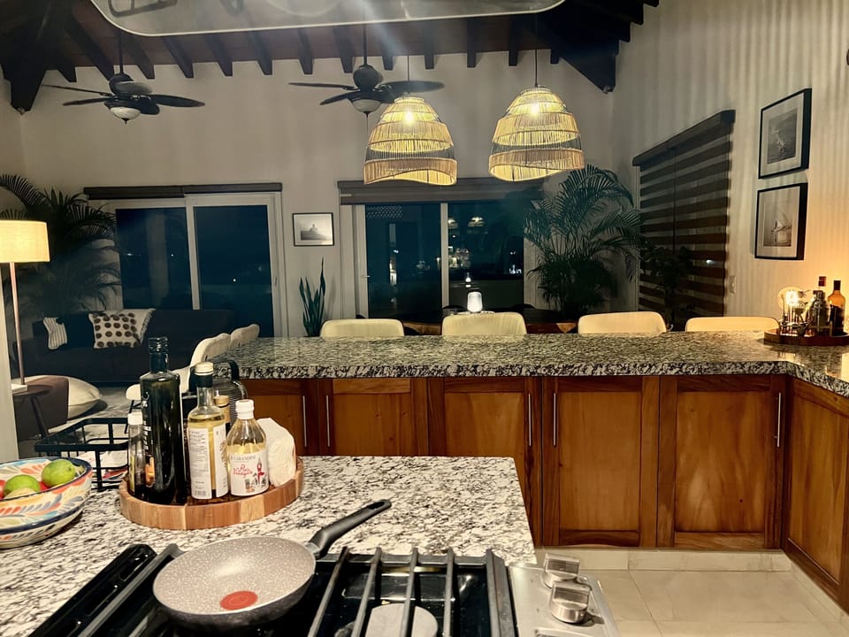 Take a seat at the Island or the expansive bar with 4 comfy captain chairs. 
