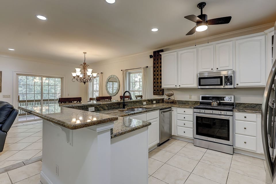 Fully stocked kitchen kitchen with stainless steel appliances