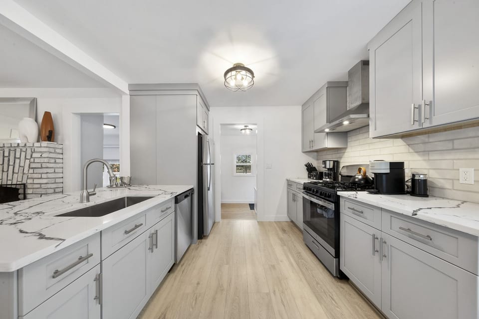 Open kitchen with oversized island and plenty of storage space          