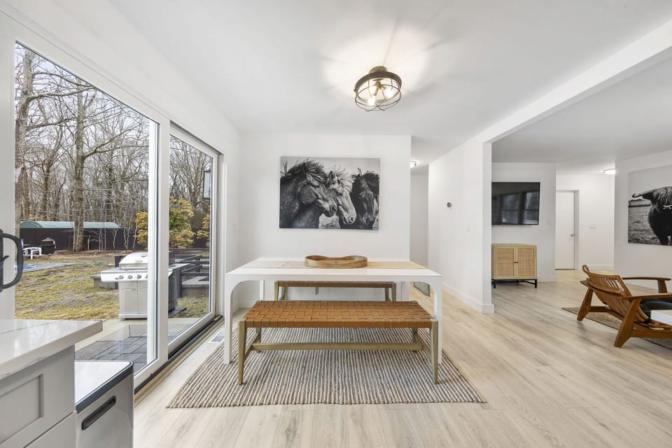 Dining area leading to patio and pool 