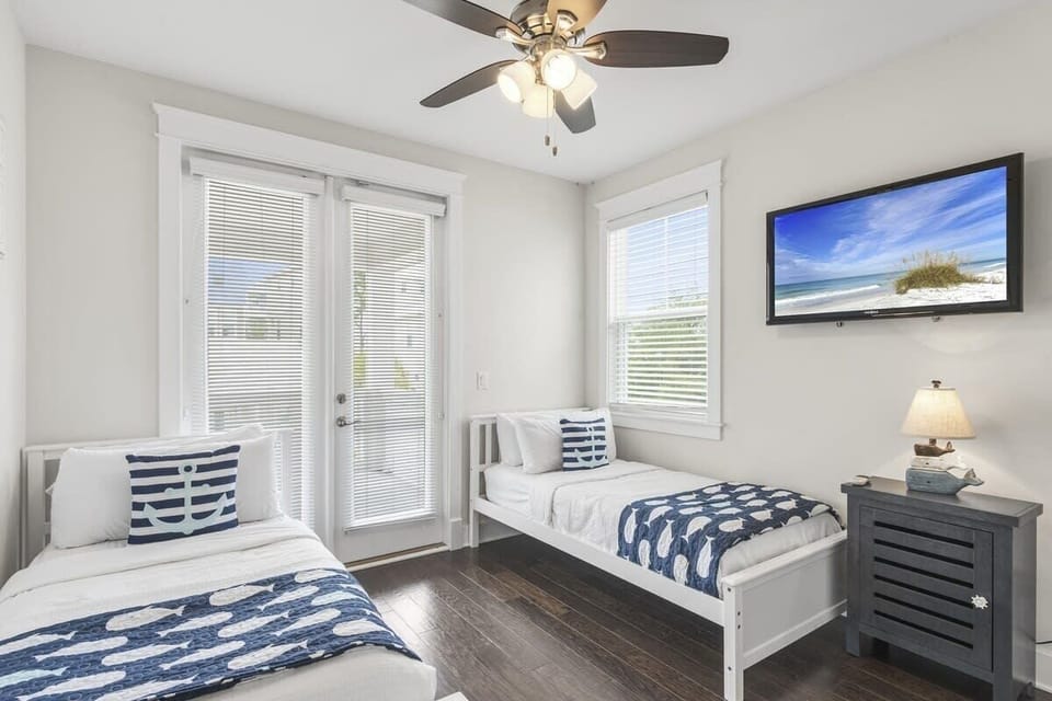 Two twin beds with TV