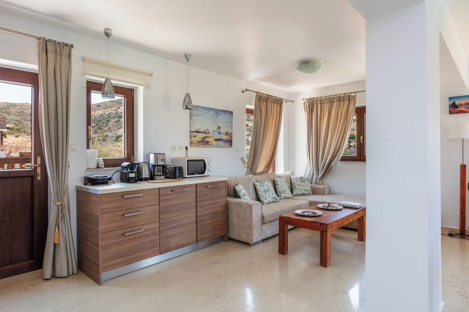 The open plan space consists of the kitchen and seating area.