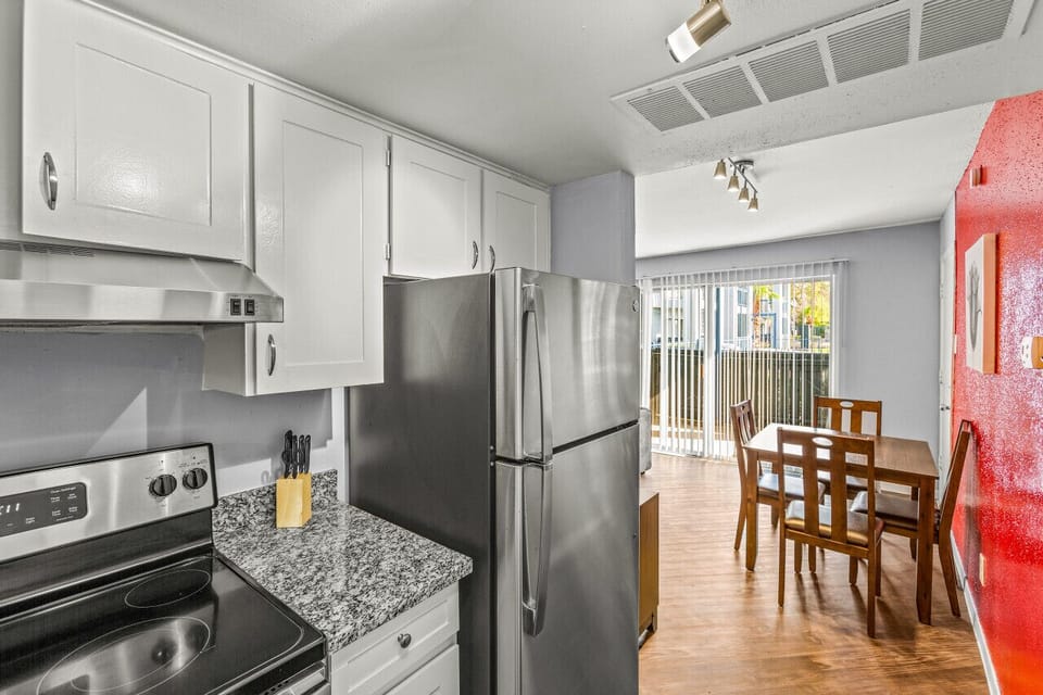 Full kitchen area offering stainless appliances and easy living flow.