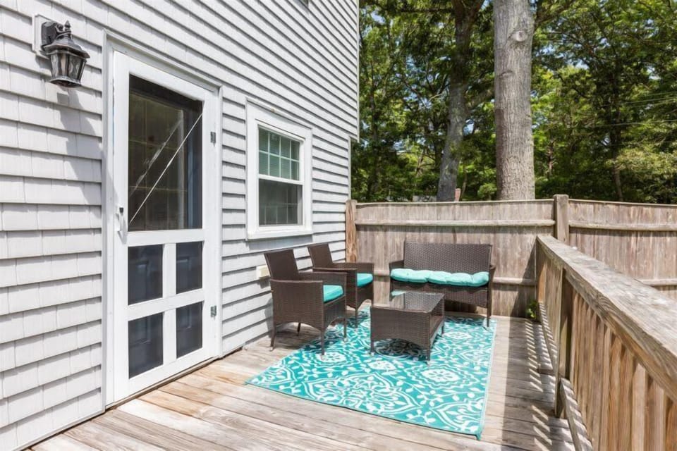 Porch and grill area next to the pool