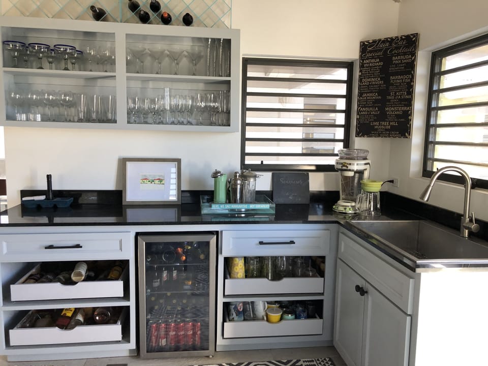 Wet bar and beverage refrigerator.