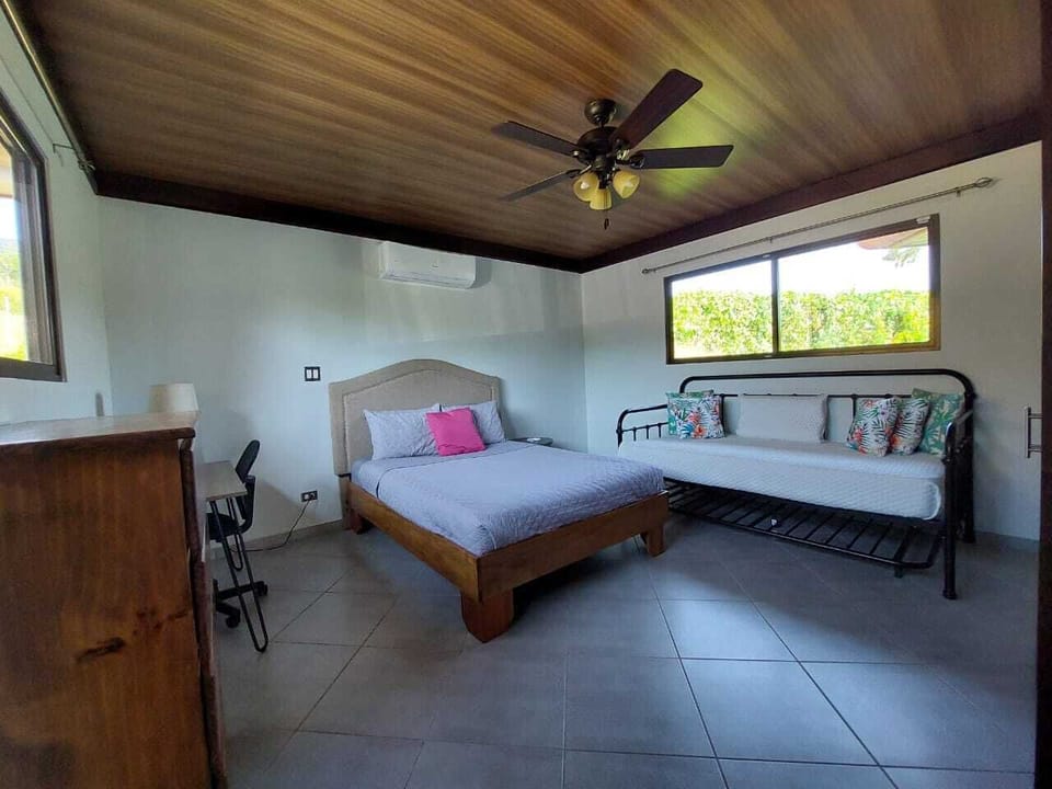 Bedroom 3 with a double and single bed