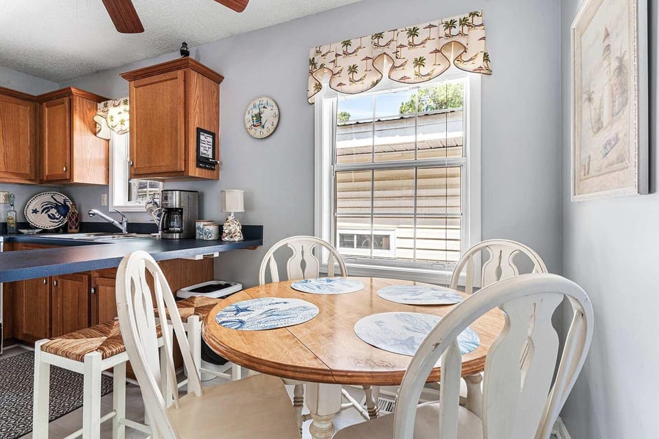 Cozy kitchen nook with sunny window and charming details