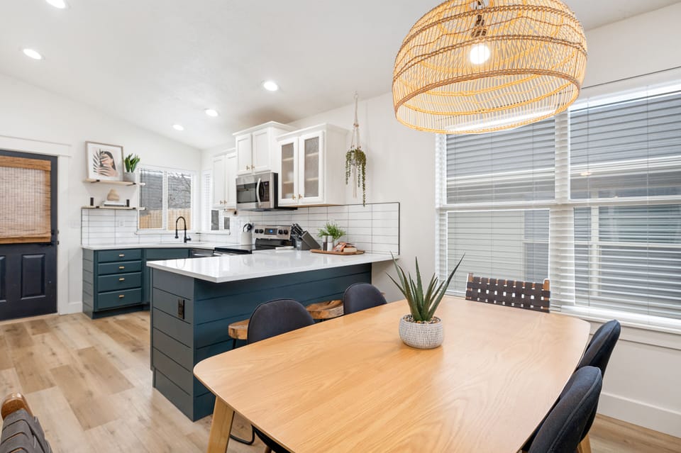 Beautiful white quartz countertops& subway tile backsplash make a modern kitchen