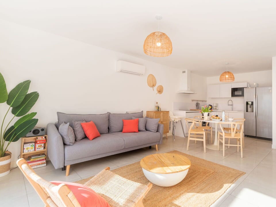 Couch, Furniture, Property, Table, Picture Frame, Window, Azure, Interior Design, Lighting, Comfort