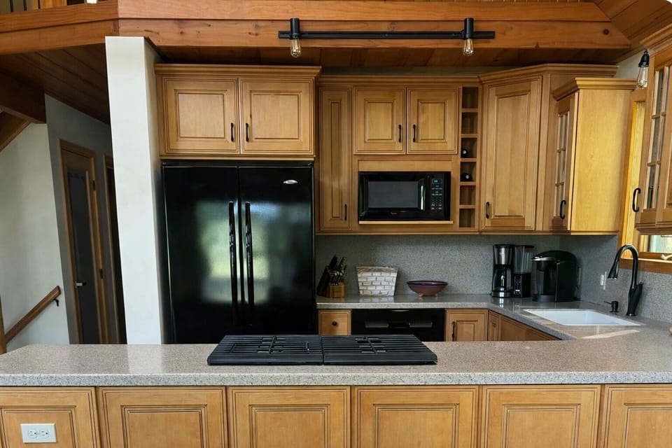Our kitchen is well-appointed with all the amenities you need. No supplies.
