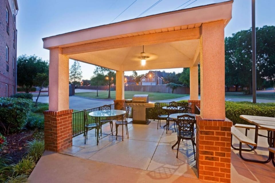 Sip morning coffee under the covered patio with grill.