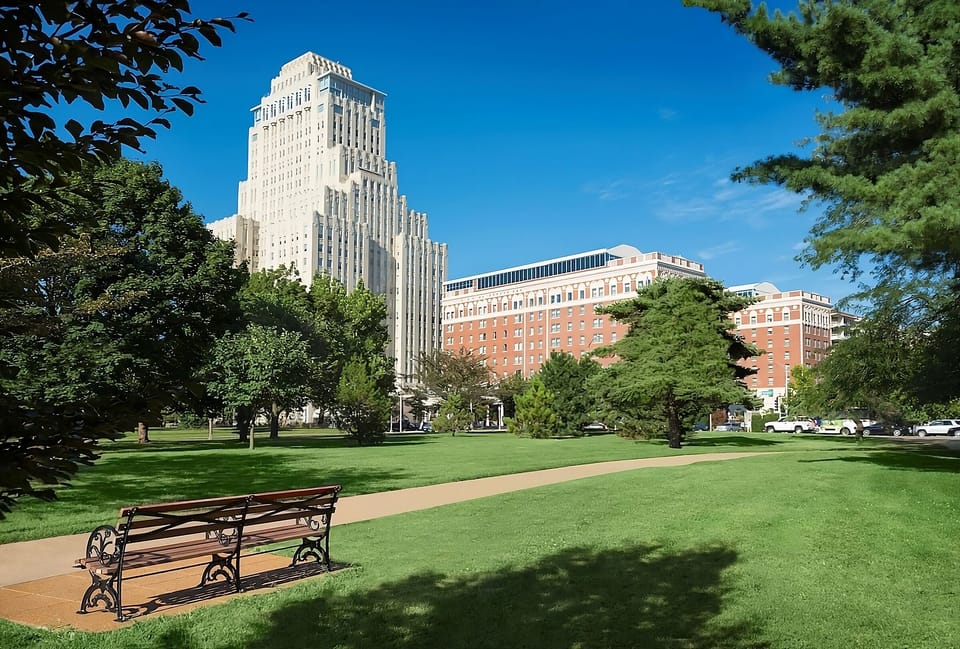 Stroll through lush green lawns for a calm city escape.