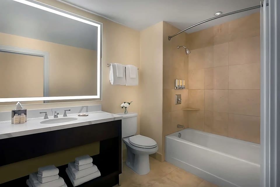 Refresh with a soak in the spotless, modern tub.