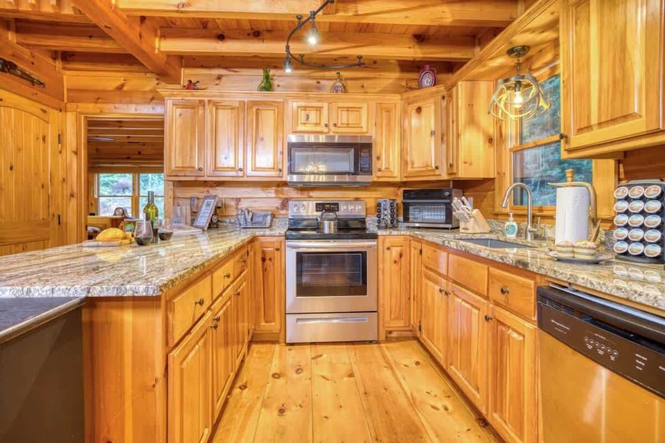 All stainless steel appliances - stove, microwave, refrigerator, toaster and dishwasher