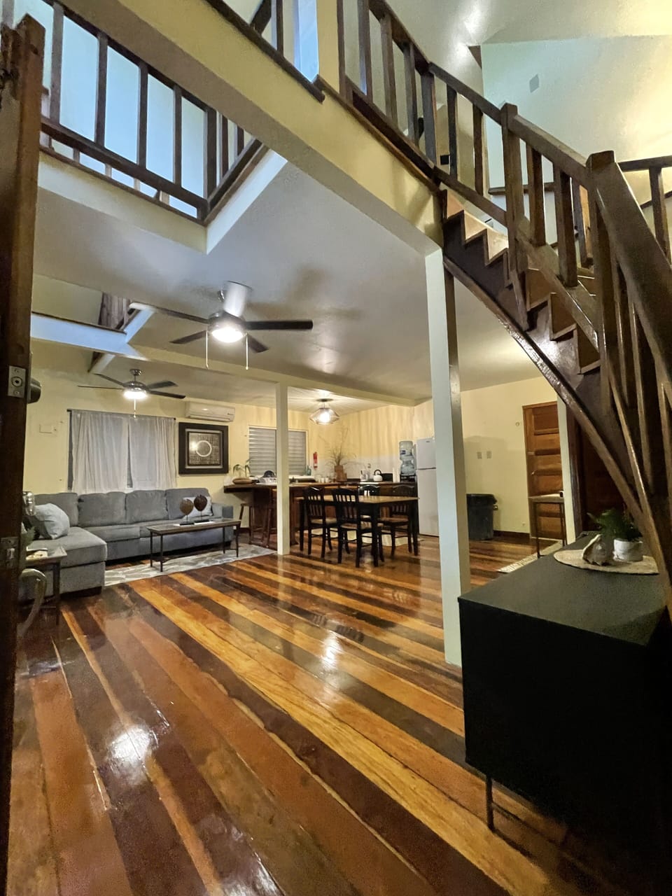 Open, greatroom style first floor with a loft bedroom