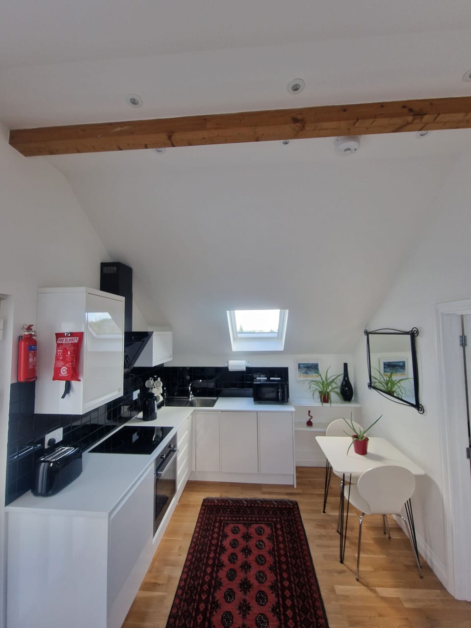 Vaulted fully equipped kitchen.