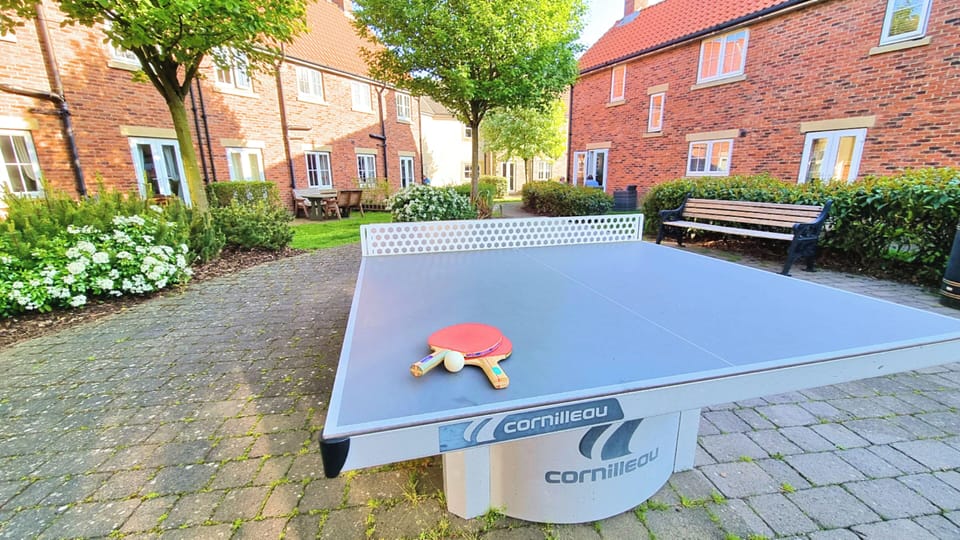Table Tennis in a courtyard behind our lovely cottage