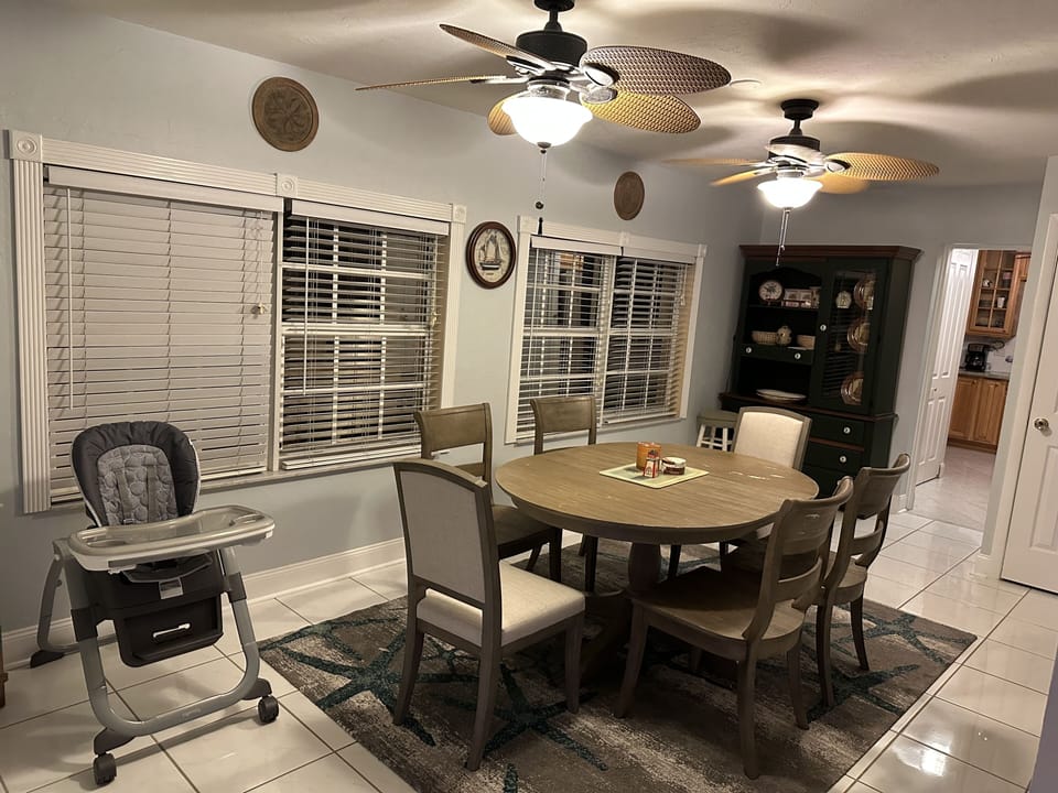 Dining area with six chairs. 