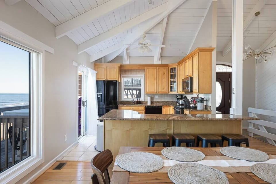 Fully Stocked Kitchen with bar seating for 4 and ocean views (w/ dishwasher, fridge, oven, microwave, toaster, drip & Krups coffee maker and more)