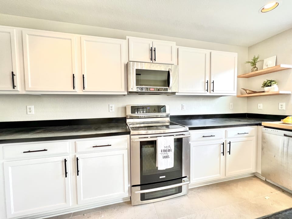 A clean, bright fully equipped kitchen for effortless meal prep and dining