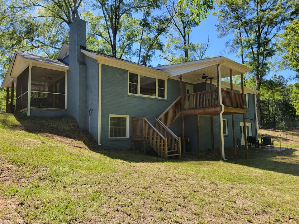 Back of the house, screened in porch