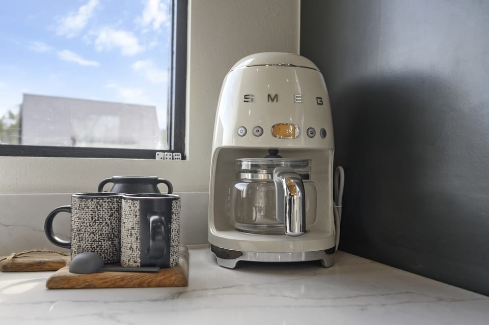 SMEG Drip Coffee maker & Keurig provided (not shown in pic) *k-cups, filters, and creamer provided / ground coffee NOT provided