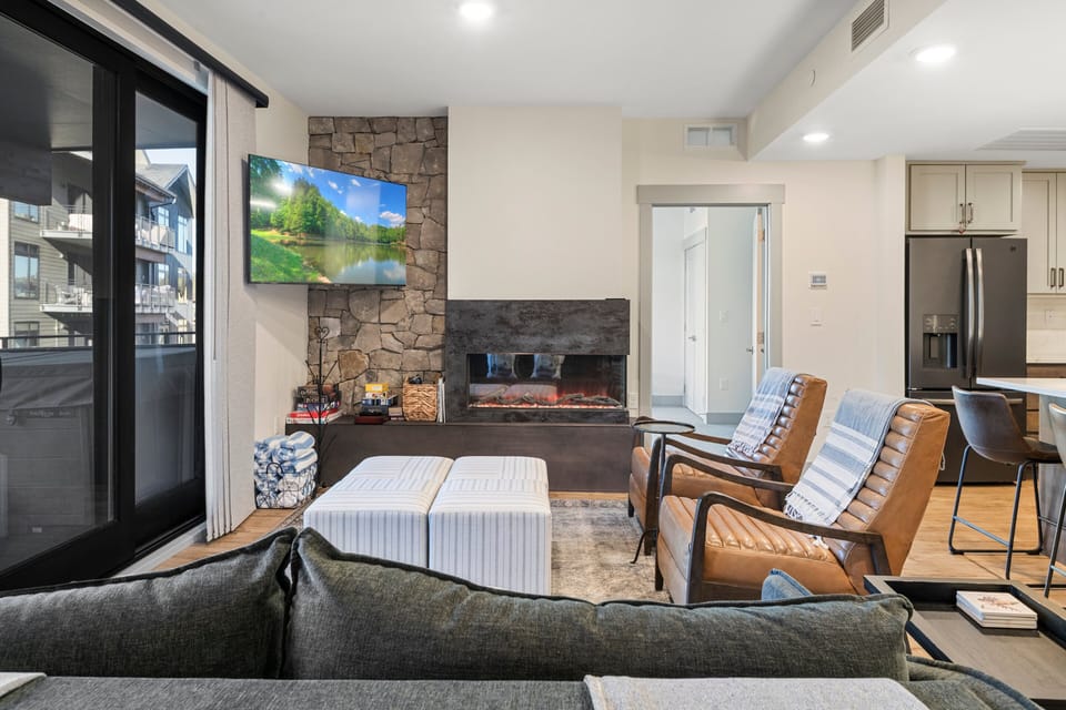 Living Area with HD TV and Custom Fireplace