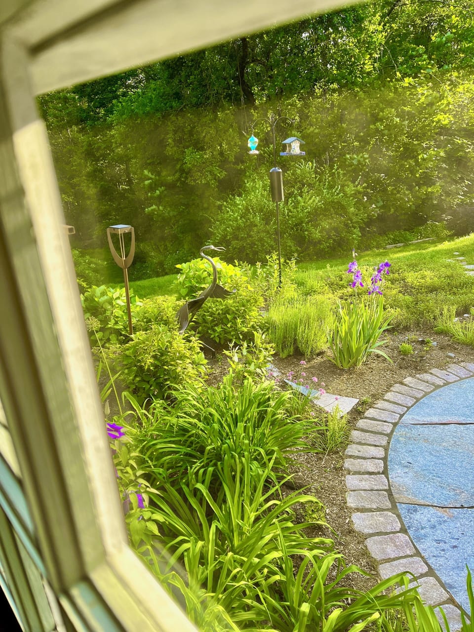 Bountiful garden views from all three windows in bedroom two.
