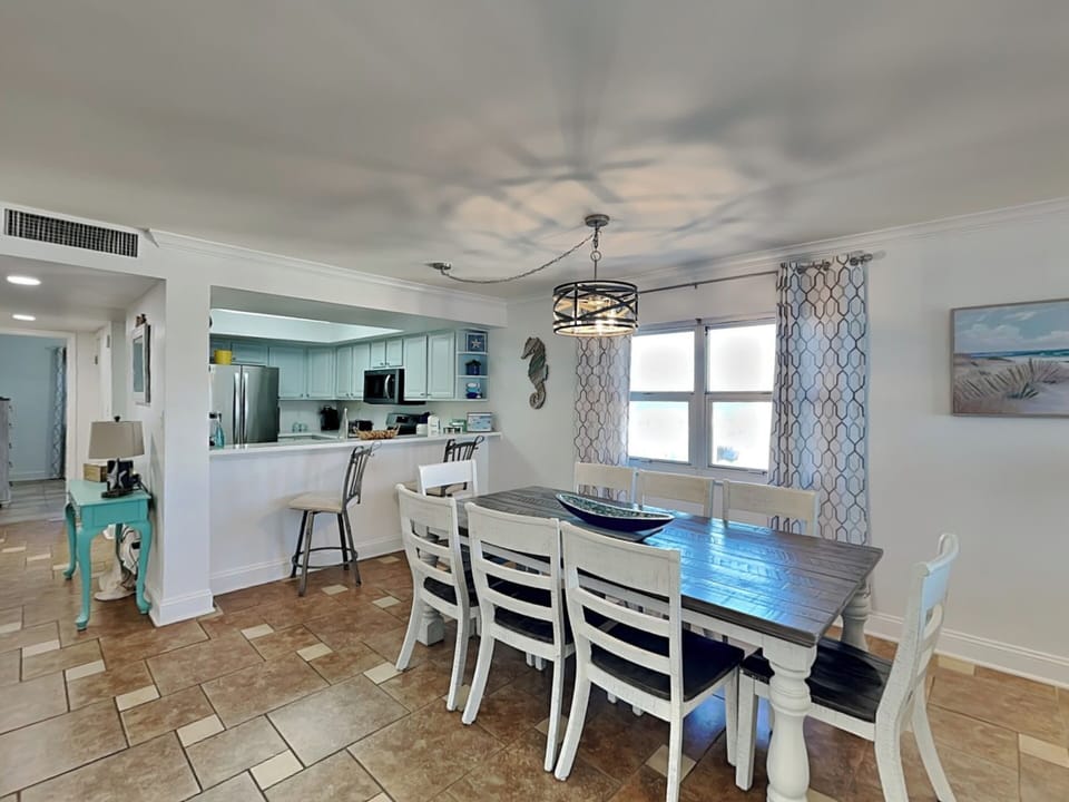Dining Area - Table for Eight and Bar Seating for Two