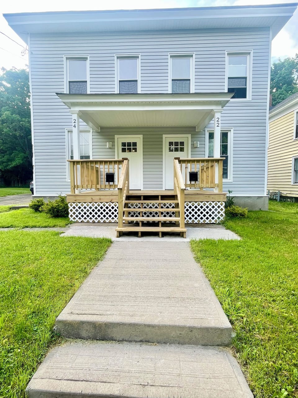 Front entrance of house. Separate door/entry way for each side.