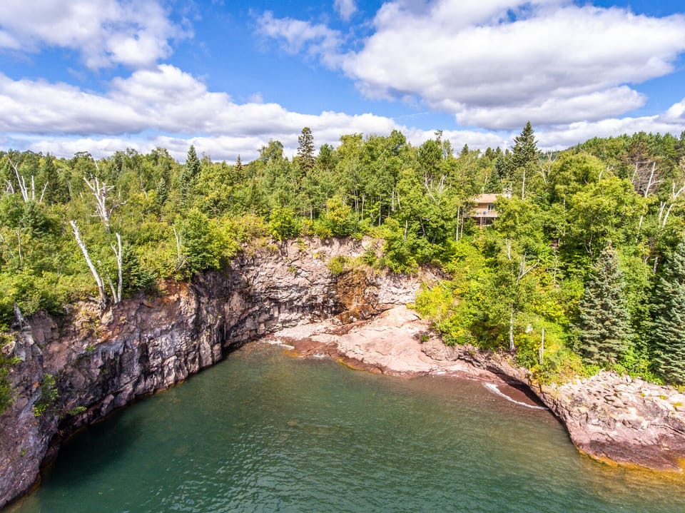 You will love the small seasonal waterfall that drops 30-40 feet into the cove.